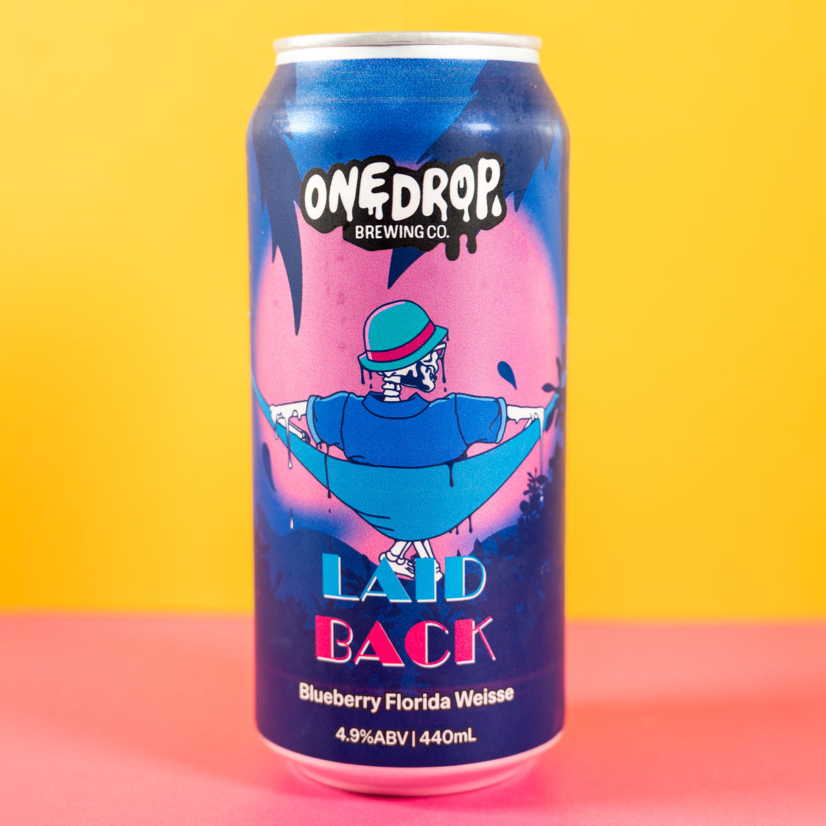 A single aluminum beverage can from One Drop Brewing Co. featuring a colorful label with a blue and pink design and the text 'Laid Back Blueberry Florida Weisse 4.